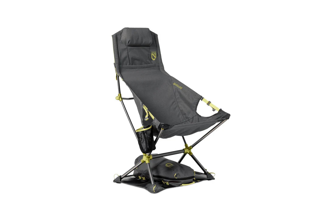 Foldable reclining camp chair with grey mesh fabric, yellow-green frame accents, and ground mat base