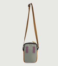 Small crossbody bag with adjustable shoulder strap, olive green body with orange trim