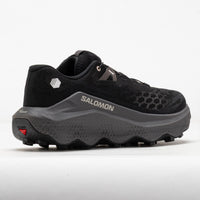 Trail running shoe rear three-quarter view showing aggressive lugged outsole and mesh upper