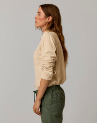 Women's long-sleeve supersoft shirt in heathered beige, side profile view on model