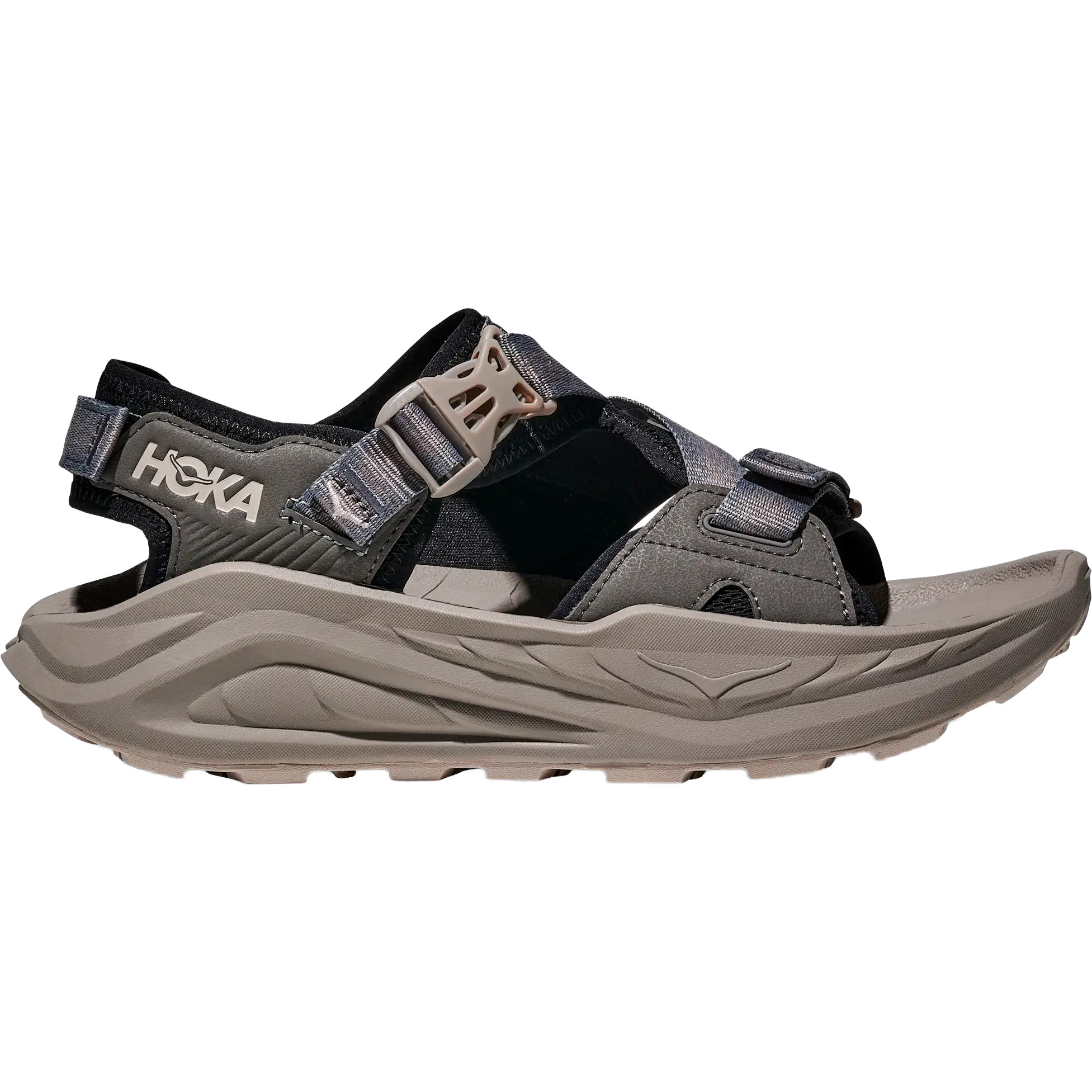 Black and gray hiking sandal with adjustable straps and chunky sole, side profile view