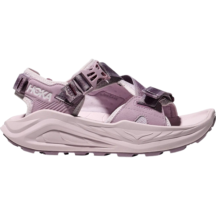 Light purple hiking sandals with adjustable straps and chunky athletic sole, side view