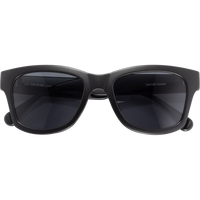 Matte black sunglasses with thick frames and dark lenses on white background