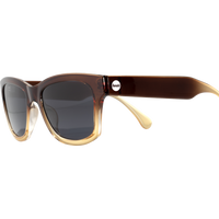 Tortoiseshell sunglasses with gradient brown to amber frames and dark lenses, side angle view