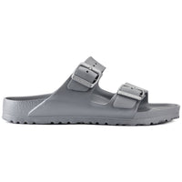 Grey metallic two-strap sandal with adjustable buckles, side view on white background