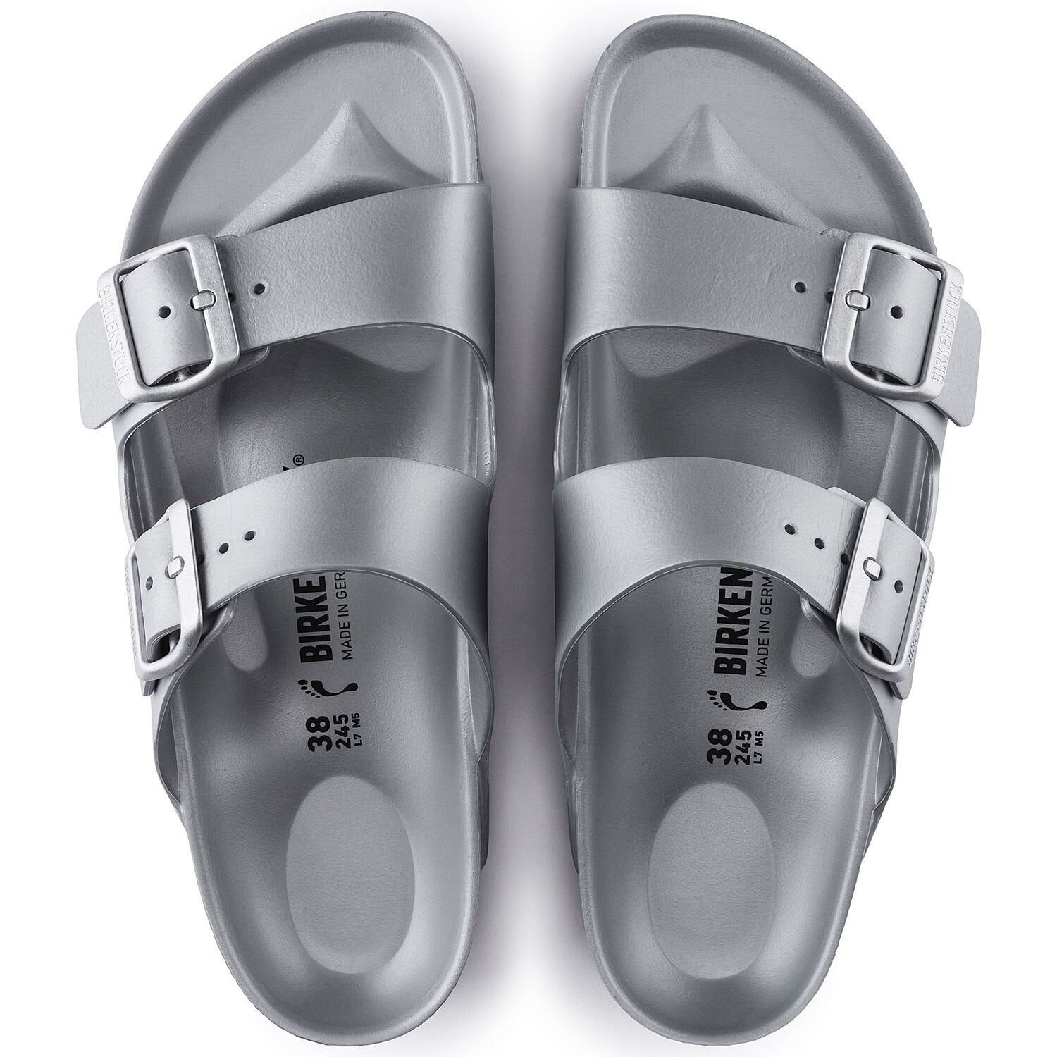 Silver metallic two-strap sandals with buckles, top view showing contoured footbed