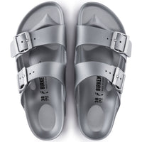 Silver metallic two-strap sandals with buckles, top view showing contoured footbed