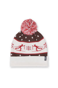 Knit winter beanie with pom-pom, Nordic skier pattern in red, brown, and white