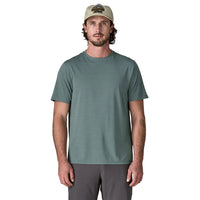 Men wearing sage green short-sleeve performance t-shirt with baseball cap, front view