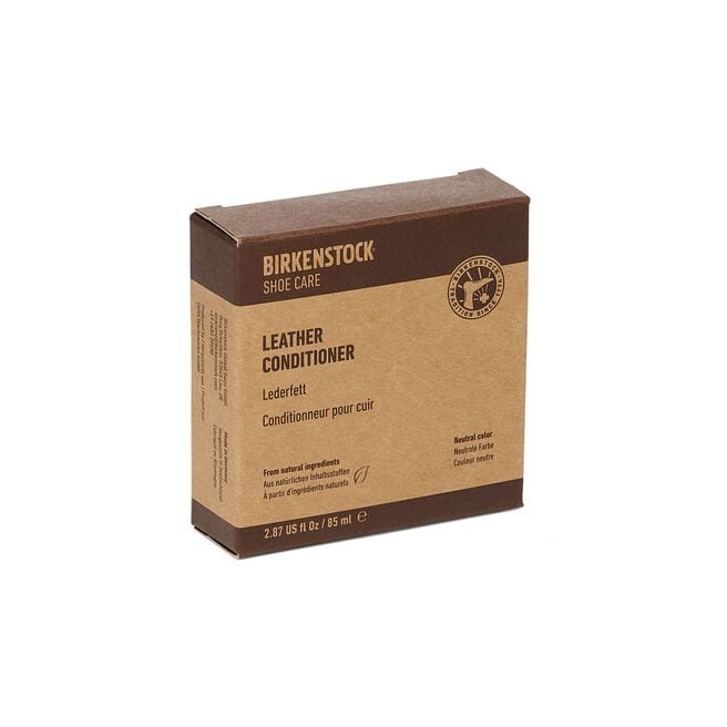 Leather conditioner in brown and tan cardboard packaging box, front view