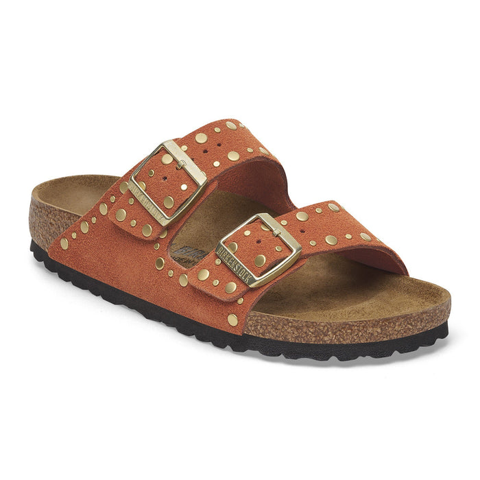 Two-strap slide sandals with studded straps and cork footbed, side view