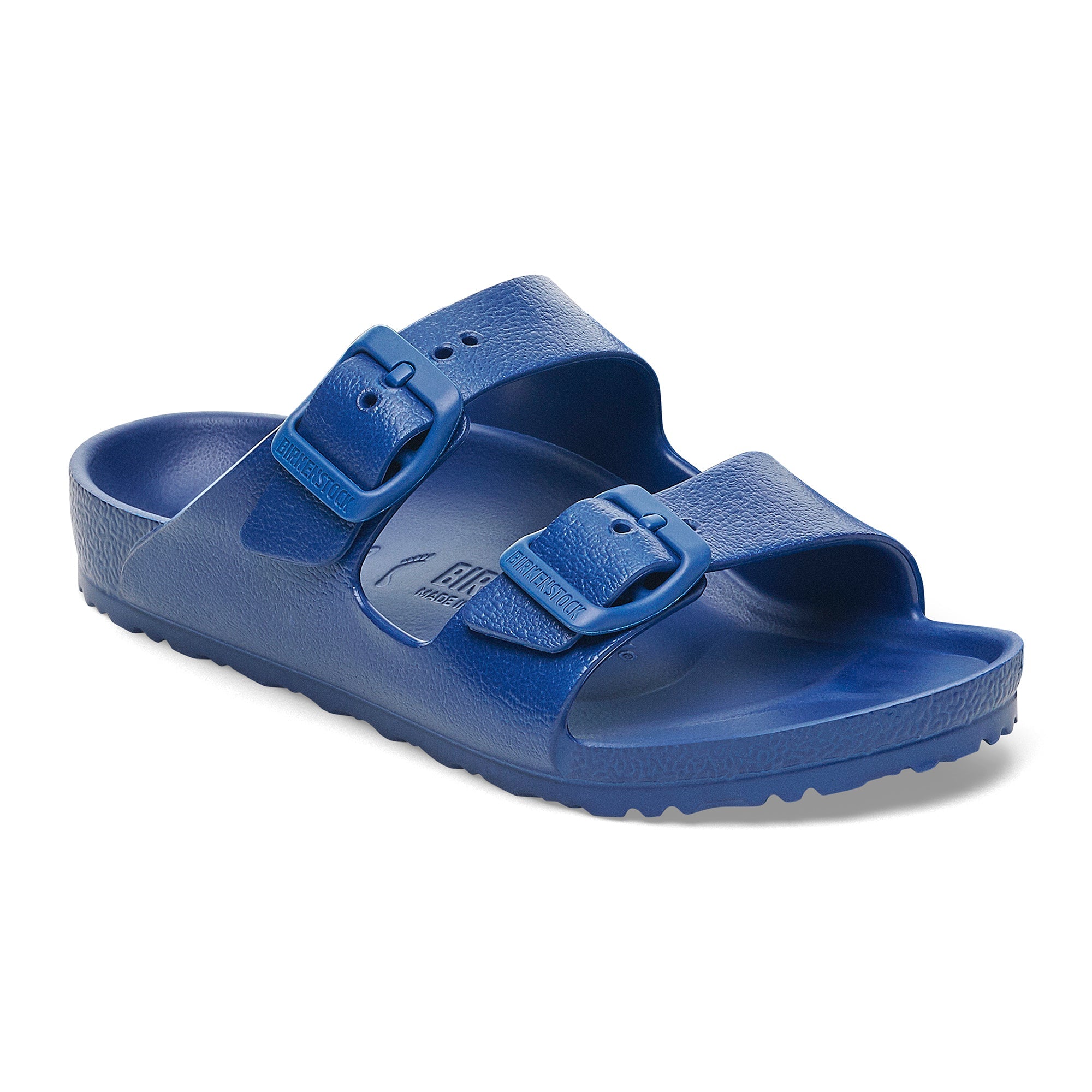 Navy blue two-strap sandals with buckle closures and textured sole