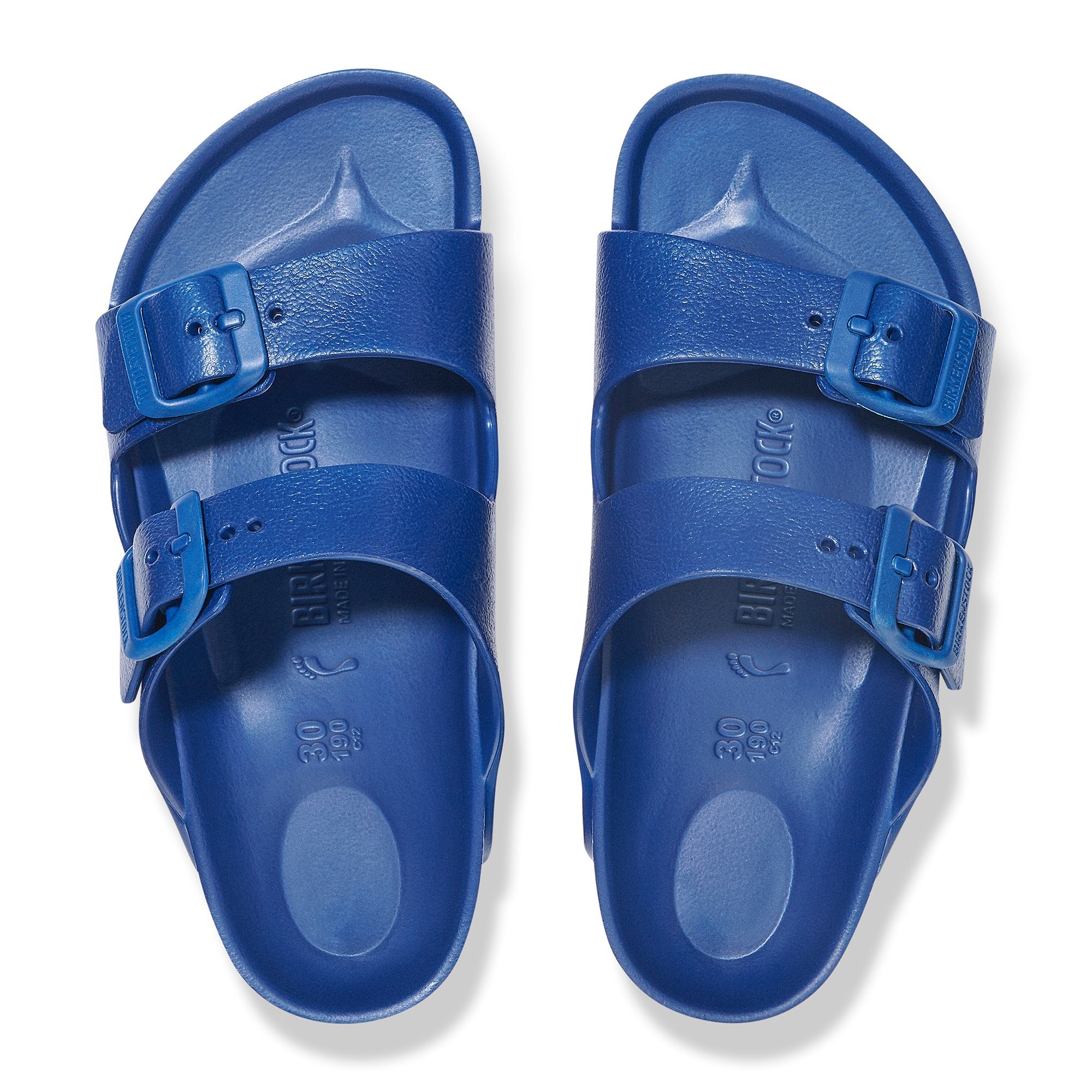 Navy blue two-strap sandals with adjustable buckles, viewed from above