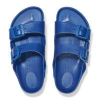 Navy blue two-strap sandals with adjustable buckles, viewed from above