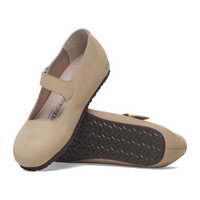 Beige leather Mary Jane shoes with adjustable strap and textured rubber sole