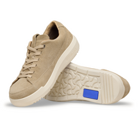 Beige suede lace-up sneakers shown from side angle with sole view