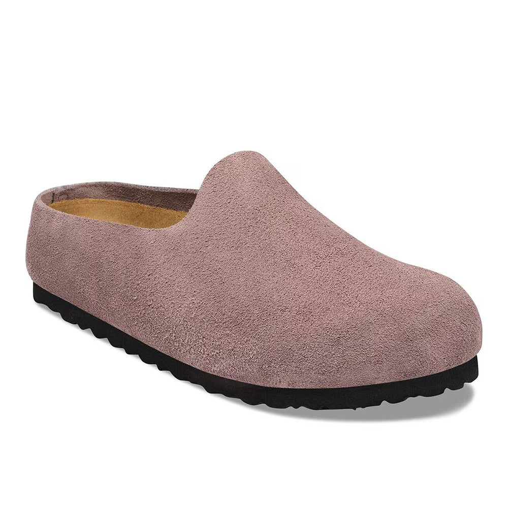Suede slip-on clog mule with closed toe, tan footbed, and black rubber sole, angled view