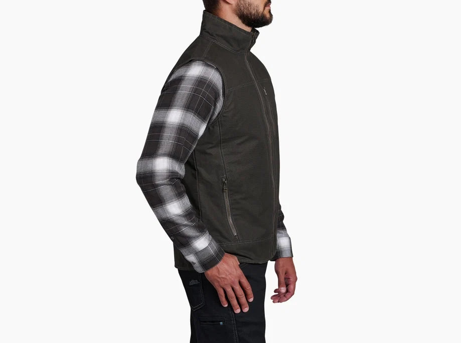 Men's sleeveless vest in dark olive, side view, worn over plaid flannel shirt