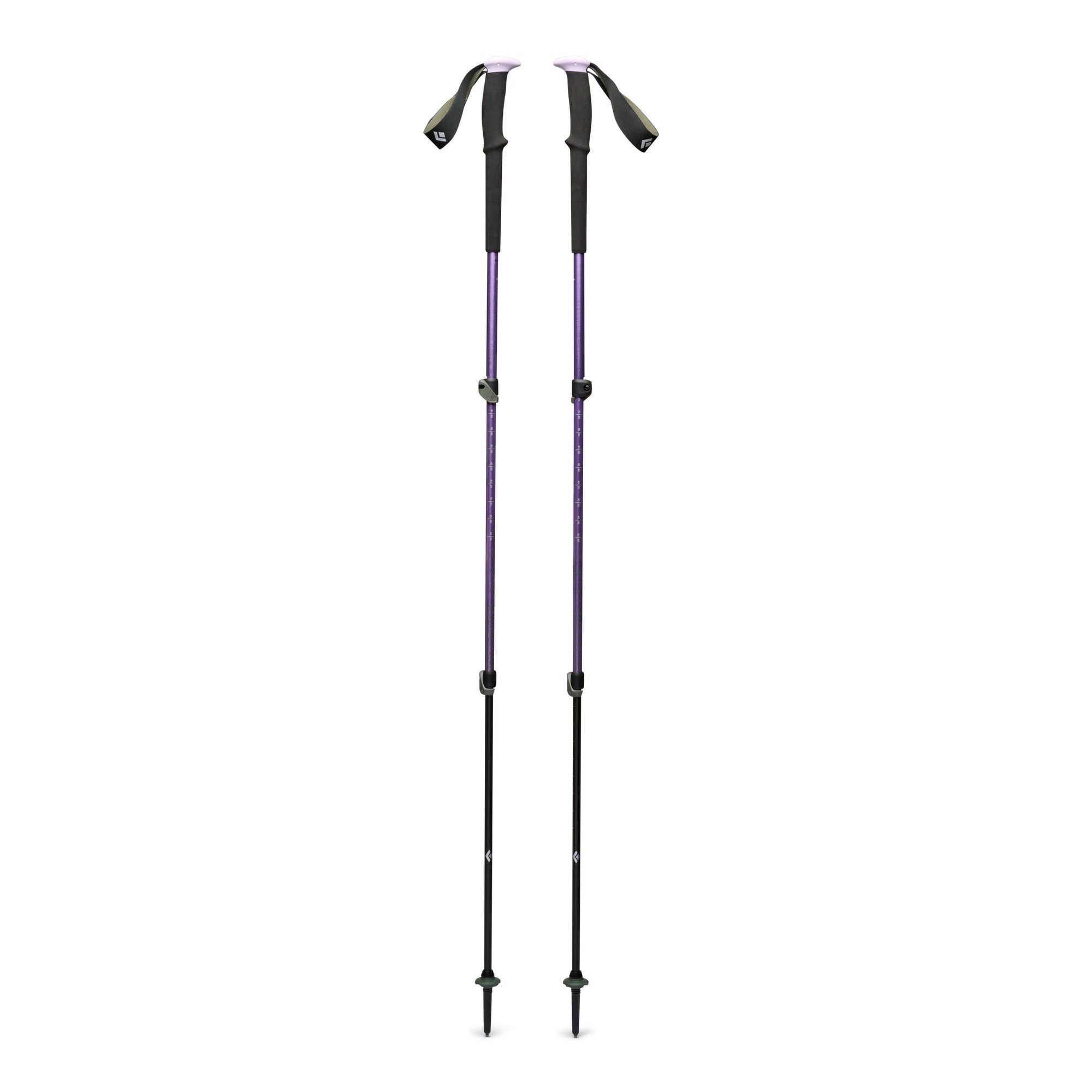 Pair of adjustable trekking poles with purple shafts, black tips, and wrist straps