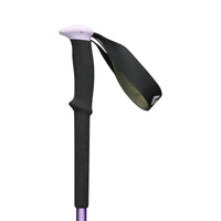 Trekking pole handle close-up showing foam grip, wrist strap, and lilac tip, detail view