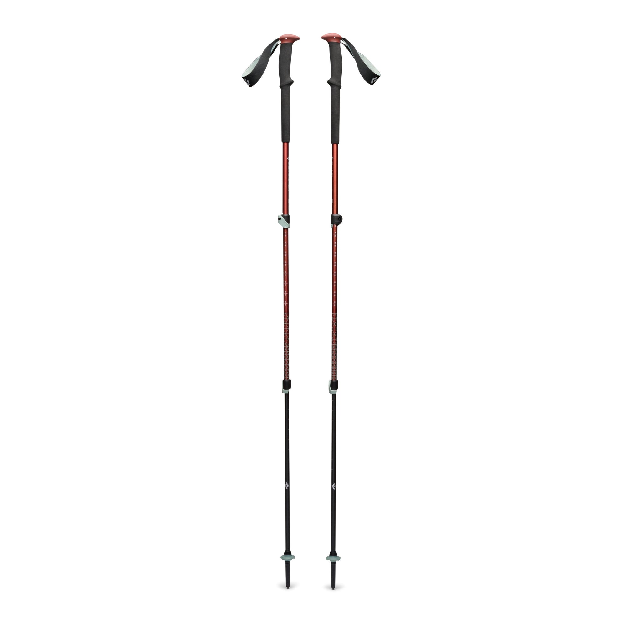 Pair of adjustable trekking poles with red upper shafts, black lower sections, and wrist straps