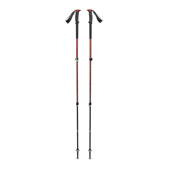 Pair of adjustable trekking poles with red upper shafts, black lower sections, and wrist straps