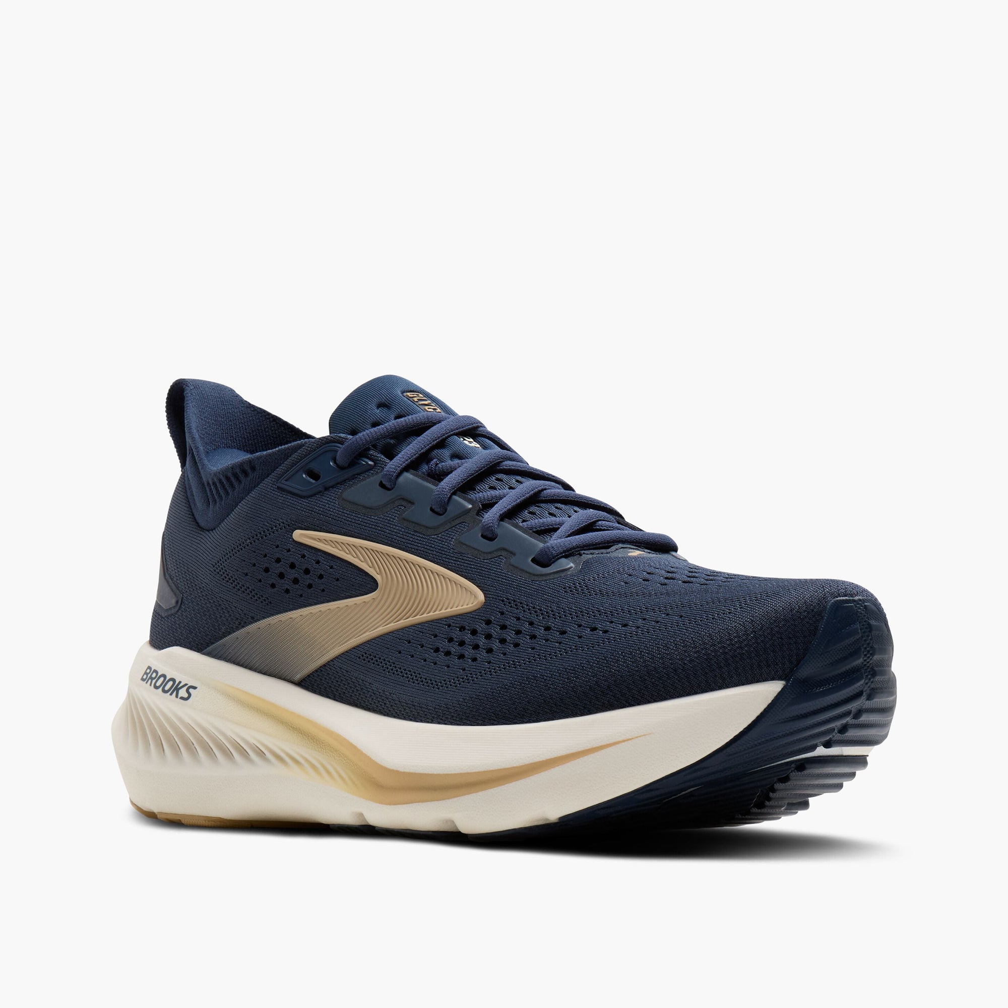 Men's running shoe in navy blue with gold accents and thick cream midsole, three-quarter front view