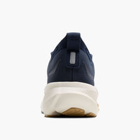 Navy blue running shoe rear view showing heel collar, reflective detail, and thick white midsole