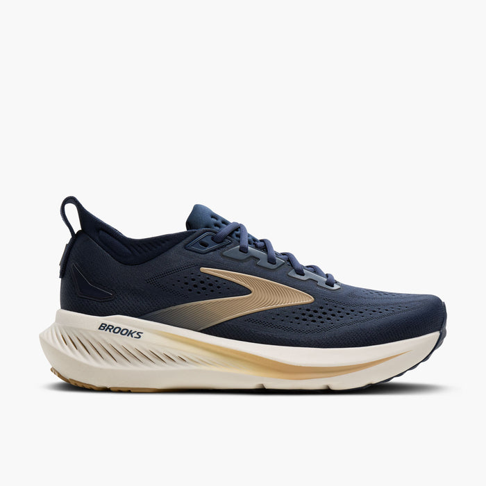 Men's road running shoe in navy blue with gold accents and thick cushioned cream midsole, lateral view