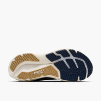 Bottom sole view of a running shoe showing navy and tan rubber outsole with cushioning details