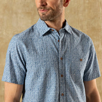 Light blue chambray short sleeve shirt with small anchor print pattern, front view