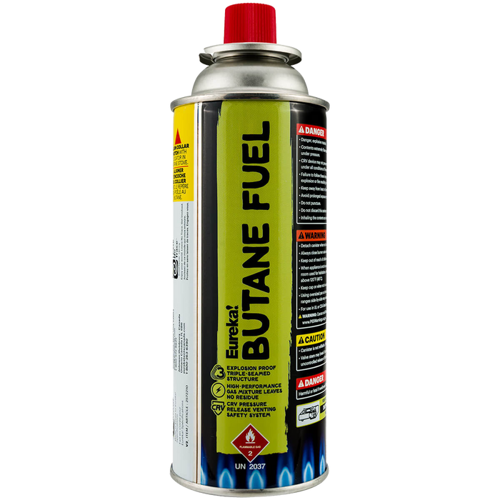 Metal aerosol canister with green and black label, red safety cap, warning labels visible