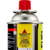 Butane fuel canister with red cap, yellow warning labels and silver valve top