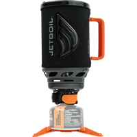 Compact camping stove system with black insulated cup, orange handle, mounted on fuel canister with tripod base