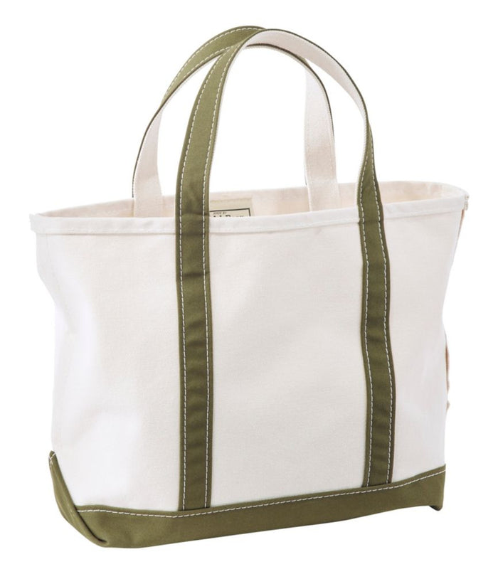 Open-top canvas tote bag with olive green handles, base trim, and white body, angled view