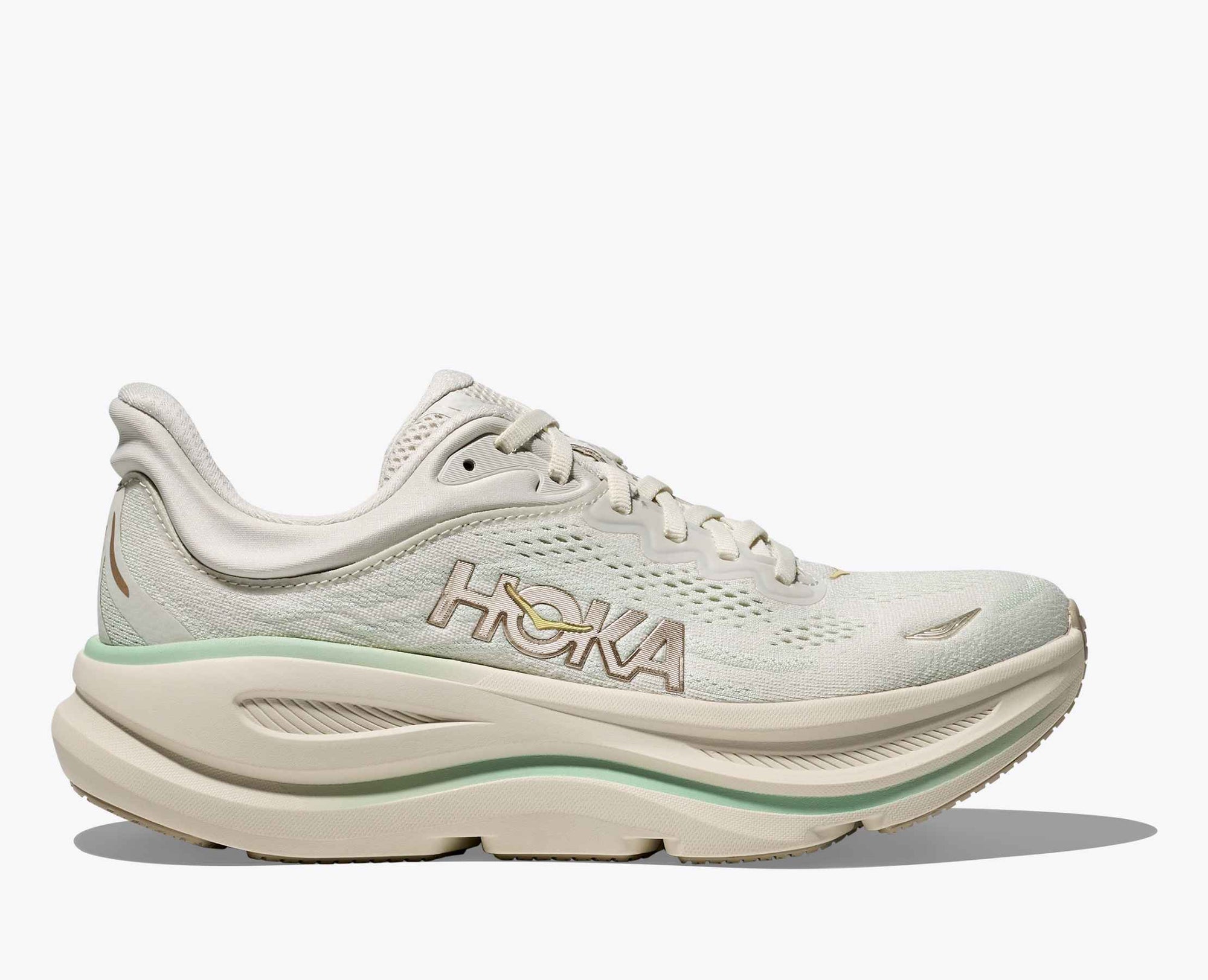 Light colored running shoe with mesh upper and thick cushioned sole, side profile view
