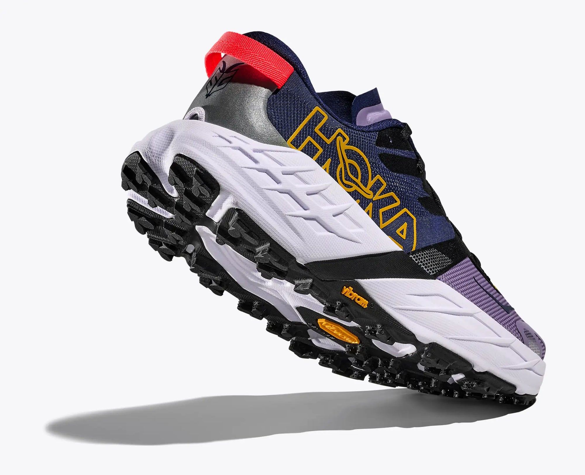Trail running shoe shown at angle highlighting chunky outsole, breathable upper, and heel pull tab