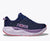 Navy blue running shoe with purple midsole and coral outsole, side profile view