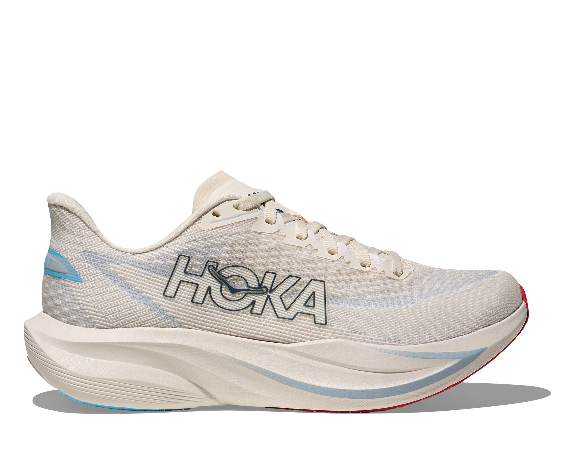 Light colored running shoe with mesh upper and thick curved sole, side profile view