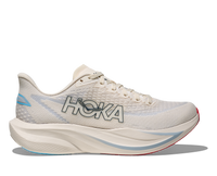 Light colored running shoe with mesh upper and thick curved sole, side profile view