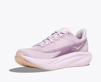 Light purple running shoe with gradient mesh upper and thick white midsole, side profile view