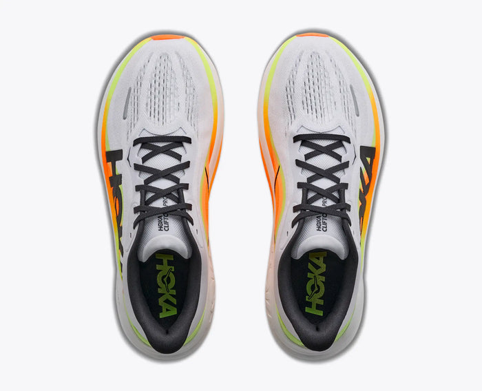 Men's running shoes top-down view, white mesh upper, neon orange and yellow-green midsole, black laces