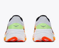 Running shoes rear view showing chunky white midsole, orange outsole, and lime green heel panel