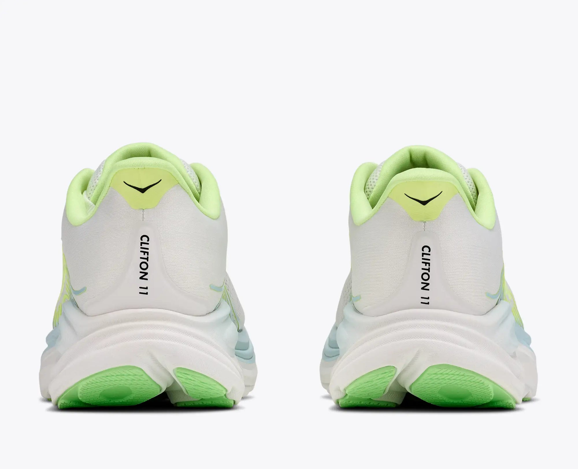 Running shoes rear view showing thick cushioned midsole, green outsole, and lime collar padding