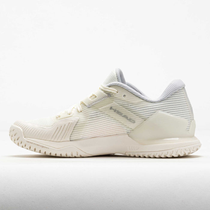 Women's low-profile tennis shoe in white and light grey with textured outsole, side view