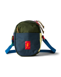 Small crossbody shoulder bag in colorblock olive and navy with adjustable blue strap, front view