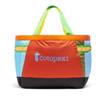 Large colorful patchwork tote bag with orange top trim and multicolored handles