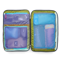 Open travel backpack showing organized interior compartments with mesh packing cubes and olive green lining