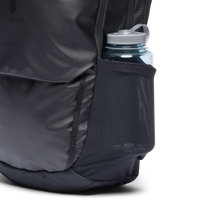 Black daypack with side water bottle pocket and mesh exterior pocket detail