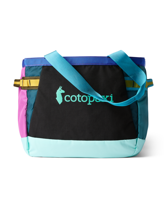 Multicolored tote bag with black front panel, colorful side panels, and teal shoulder straps